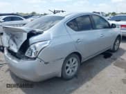 ✅ 2013 Nissan Versa S • VIN: 3N1CN7AP6DL894102 • Lot: 43109126. Listed on IAAI with 128,316 mi. Free auction sales archive from the USA and detailed vehicle history report at DreamBid. Image 4.