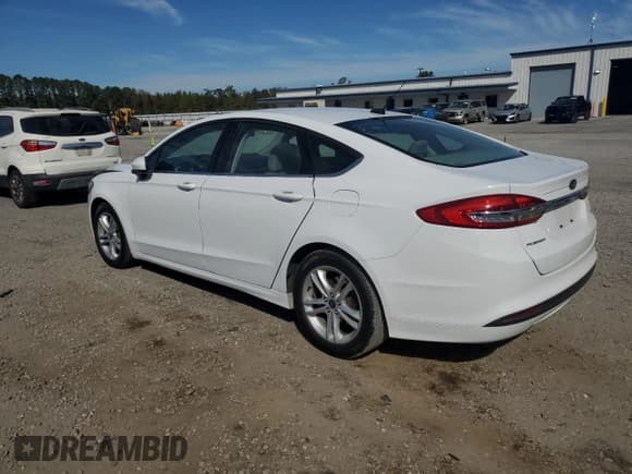 ✅ 2018 Ford Fusion SE • VIN: 3FA6P0H70JR194589 • Lot: 82743405. Wystawiony na Copart z przebiegiem 89 687 mil. Bezpłatny archiwum sprzedaży aukcyjnych z USA i szczegółowy raport historii pojazdu na DreamBid. Zdjęcie 2.
