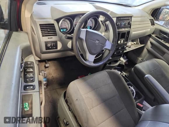 ✅ 2009 Dodge Grand Caravan SXT • VIN: 2D8HN54199R530525 • Лот: 87399245. Опубликован ранее на Copart с пробегом 201 928 миль. Бесплатный доступ к архиву аукционных продаж из США и подробный отчёт об истории автомобиля на DreamBid. Изображение 8.