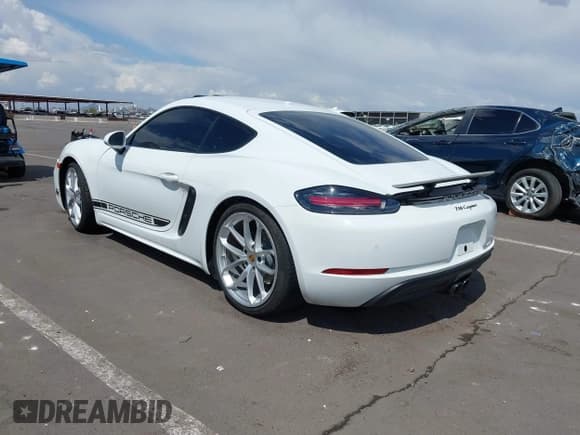 ✅ 2025 Porsche Cayman • VIN: WP0AA2A83SK255637 • Lot: 42218504. Listed on IAAI with 3,130 mi. Free auction sales archive from the USA and detailed vehicle history report at DreamBid. Image 3.