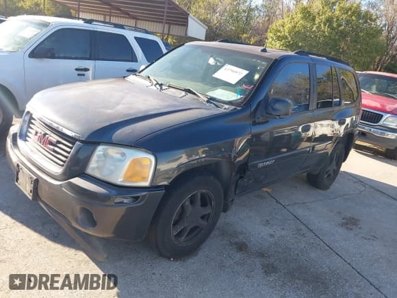 ✅ 2005 GMC Envoy SLE • VIN: 1GKDS13S652243620 • Lot: 43790972. Listed on IAAI with 301,454 mi. Free auction sales archive from the USA and detailed vehicle history report at DreamBid. Image 2.