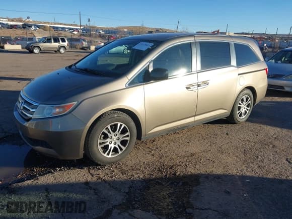 ✅ 2013 Honda Odyssey EX • VIN: 5FNRL5H49DB024582 • Lot: 43875807. Listed on IAAI with 111,799 mi. Free auction sales archive from the USA and detailed vehicle history report at DreamBid. Image 2.