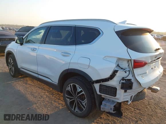 2020 Hyundai Santa Fe SEL z VIN 5NMS3CAAXLH216029, wystawiony jako IAAI lot #43222450 z przebiegiem 70 337 mil mil oraz . Historia ofert i sprzedaży dostępna na DreamBid. Obrazek 3.