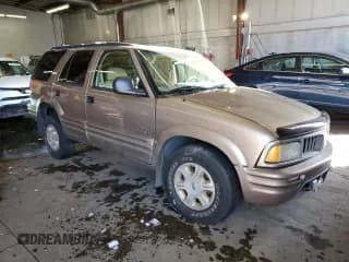 ✅ 1997 Oldsmobile Bravada • VIN: 1GHDT13W8V2706833 • Lot: 45107355. Listed on Copart with 106,979 mi. Free auction sales archive from the USA and detailed vehicle history report at DreamBid. Image 4.