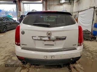 ✅ 2015 Cadillac SRX • VIN: 3GYFNAE37FS631960 • Лот: 93831815. Опубликован ранее на Copart с пробегом 144 459 миль. Бесплатный доступ к архиву аукционных продаж из США и подробный отчёт об истории автомобиля на DreamBid. Изображение 6.