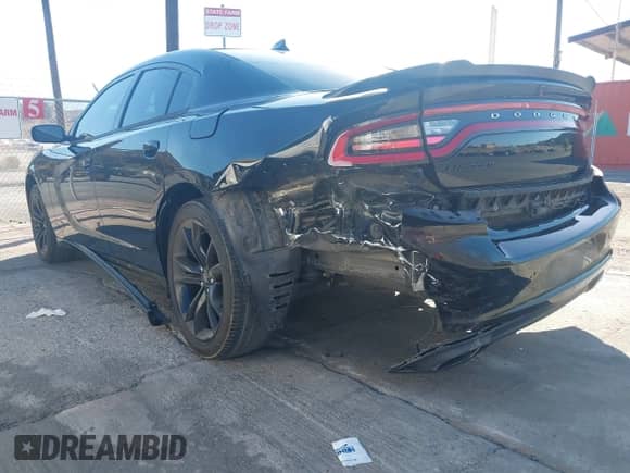 2018 Dodge Charger SXT Plus with VIN 2C3CDXHG6JH174345, listed as a IAAI auction lot 43388377 with 76,831 mi miles and . Bid and sale history available at DreamBid. Image 3.