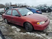 ✅ 2002 Chevrolet Prizm • VIN: 1Y1SK52852Z403372 • Lot: 45116165. Listed on Copart with 96,212 mi. Free auction sales archive from the USA and detailed vehicle history report at DreamBid. Image 4.