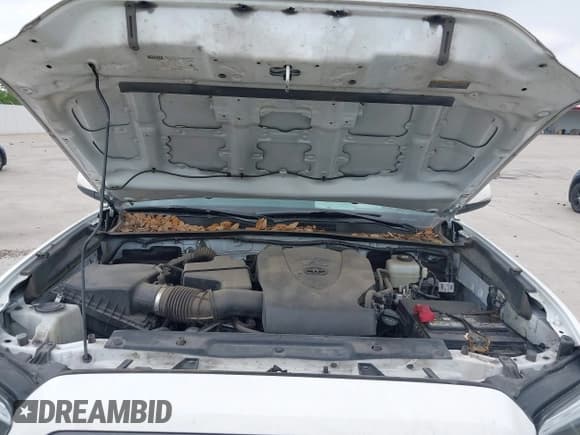 ✅ 2022 Toyota Tacoma SR • VIN: 3TMCZ5AN7NM493268 • Lot: 42041593. Listed on IAAI with 100,589 mi. Free auction sales archive from the USA and detailed vehicle history report at DreamBid. Image 10.