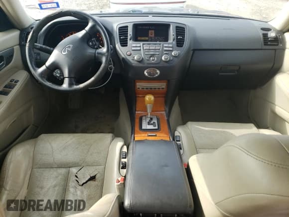 ✅ 2004 Infiniti M • VIN: JNKAY41E54M401281 • Lot: 70442894. Listed on Copart with 117,572 mi. Free auction sales archive from the USA and detailed vehicle history report at DreamBid. Image 8.