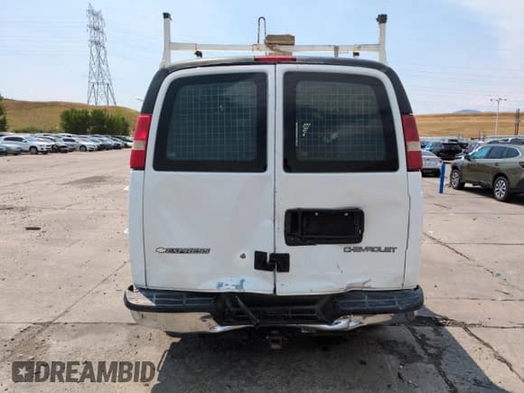 ✅ 2013 Chevrolet Express Cargo • VIN: 1GCWGFCG1D1151446 • Lot: 66689195. Listed on Copart with 165,126 mi. Free auction sales archive from the USA and detailed vehicle history report at DreamBid. Image 6.