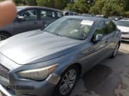 ✅ 2014 Infiniti Q50 Premium • VIN: JN1BV7AP2EM680744 • Lot: 43310589. Listed on IAAI with 209,719 mi. Free auction sales archive from the USA and detailed vehicle history report at DreamBid. Image 12.