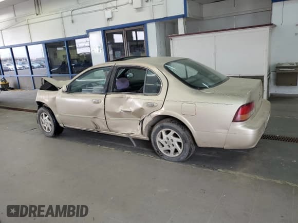 ✅ 1997 Nissan Maxima GXE • VIN: JN1CA21D1VT873935 • Lot: 70561535. Listed on Copart with 279,481 mi. Free auction sales archive from the USA and detailed vehicle history report at DreamBid. Image 2.