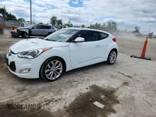 2015 Hyundai Veloster z VIN KMHTC6AD3FU229648, wystawiony jako Copart lot #69972395 z przebiegiem 107 024 mil mil oraz Szkoda całkowita • Salvage title. Historia ofert i sprzedaży dostępna na DreamBid. Obrazek 1.