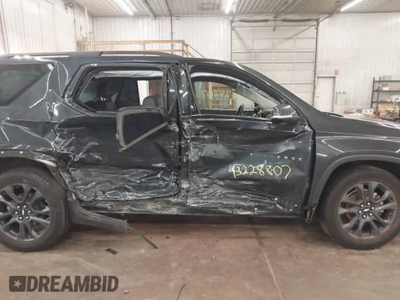 2020 Chevrolet Traverse RS with VIN 1GNEVJKW8LJ113859, listed as a IAAI auction lot 43228807 with 62,397 mi miles and . Bid and sale history available at DreamBid. Image 14.