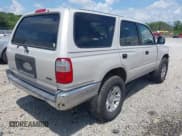 ✅ 2000 Toyota 4Runner • VIN: JT3GM84R0Y0055140 • Lot: 42696053. Listed on IAAI with 183,711 mi. Free auction sales archive from the USA and detailed vehicle history report at DreamBid. Image 4.