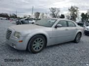 ✅ 2006 Chrysler 300 C • VIN: 2C3LA63H76H135354 • Lot: 88823075. Listed on Copart with 33,488 mi. Free auction sales archive from the USA and detailed vehicle history report at DreamBid. Image 1.