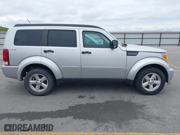 ✅ 2010 Dodge Nitro SXT • VIN: 1D4PU5GK8AW121691 • Lot: 42735788. Listed on IAAI with 206,284 mi. Free auction sales archive from the USA and detailed vehicle history report at DreamBid. Image 13.