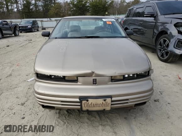✅ 1997 Oldsmobile Cutlass Supreme S • VIN: 1G3WH12MXVF305924 • Lot: 47929345. Listed on Copart with 85,967 mi. Free auction sales archive from the USA and detailed vehicle history report at DreamBid. Image 5.