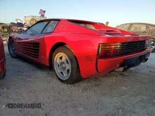 ✅ 1986 Ferrari Testarossa • VIN: ZFFSA17A5G0063021 • Lot: 75186264. Wystawiony na Copart z przebiegiem 14 606 mil. Bezpłatny archiwum sprzedaży aukcyjnych z USA i szczegółowy raport historii pojazdu na DreamBid. Zdjęcie 2.