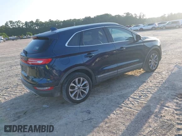 ✅ 2015 Lincoln MKC • VIN: 5LMCJ2A97FUJ08600 • Lot: 42810572. Listed on IAAI with 169,204 mi. Free auction sales archive from the USA and detailed vehicle history report at DreamBid. Image 4.