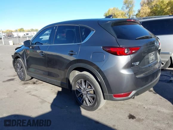 ✅ 2017 Mazda CX-5 Grand Touring • VIN: JM3KFBDL8H0163019 • Lot: 43535454. Listed on IAAI with 101,011 mi. Free auction sales archive from the USA and detailed vehicle history report at DreamBid. Image 3.