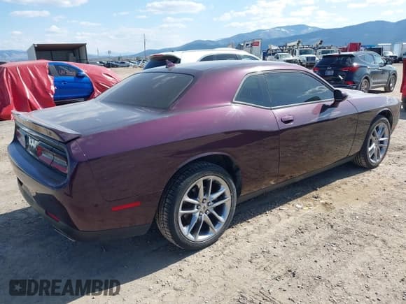 ✅ 2022 Dodge Challenger SXT • VIN: 2C3CDZGG7NH234412 • Lot: 42116869. Listed on IAAI with 61,853 mi. Free auction sales archive from the USA and detailed vehicle history report at DreamBid. Image 4.