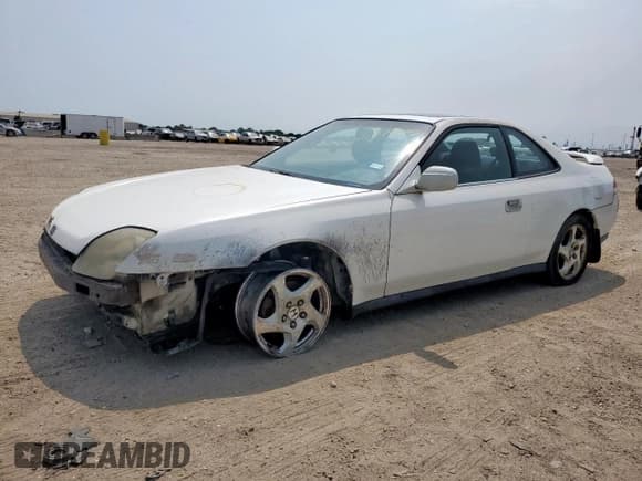✅ 1998 Honda Prelude • VIN: JHMBB6240WC006599 • Lot: 57177035. Listed on Copart with 172,435 mi. Free auction sales archive from the USA and detailed vehicle history report at DreamBid. Image 1.