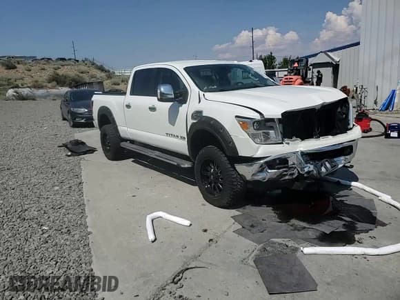 ✅ 2016 Nissan Titan SL • VIN: 1N6BA1F40GN513720 • Lot: 70603085. Listed on Copart with 68,061 mi. Free auction sales archive from the USA and detailed vehicle history report at DreamBid. Image 14.