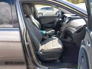 2018 Hyundai Santa Fe 2.4L z VIN 5NMZU3LBXJH098272, wystawiony jako IAAI lot #43375252 z przebiegiem 96 576 mil mil oraz . Historia ofert i sprzedaży dostępna na DreamBid. Obrazek 5.