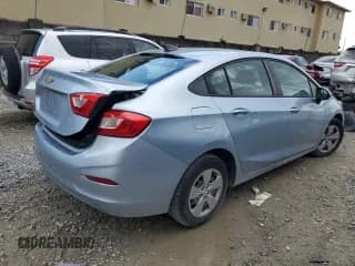 ✅ 2018 Chevrolet Cruze LS • VIN: 1G1BC5SM4J7129597 • Lot: 62502963. Listed on Copart with 62,065 mi. Free auction sales archive from the USA and detailed vehicle history report at DreamBid. Image 3.