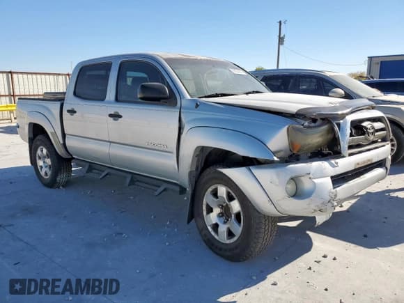 ✅ 2010 Toyota Tacoma PreRunner • VIN: 5TEJU4GN3AZ679247 • Lot: 92254865. Listed on Copart with 216,189 mi. Free auction sales archive from the USA and detailed vehicle history report at DreamBid. Image 4.
