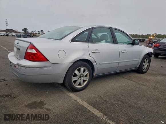 ✅ 2005 Ford Five Hundred SE • VIN: 1FAFP23165G144727 • Lot: 93308475. Wystawiony na Copart z przebiegiem 118 061 mil. Bezpłatny archiwum sprzedaży aukcyjnych z USA i szczegółowy raport historii pojazdu na DreamBid. Zdjęcie 3.
