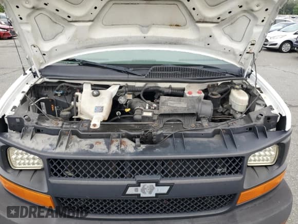 ✅ 2015 Chevrolet Express Cargo • VIN: 1GCWGFCF3F1111105 • Lot: 68623425. Wystawiony na Copart z przebiegiem 208 639 mil. Bezpłatny archiwum sprzedaży aukcyjnych z USA i szczegółowy raport historii pojazdu na DreamBid. Zdjęcie 12.