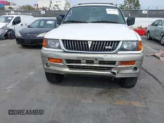 ✅ 1999 Mitsubishi Montero Sport Limited • VIN: JA4MT41R3XP025483 • Lot: 43073966. Wystawiony na IAAI z przebiegiem 104 991 mil. Bezpłatny archiwum sprzedaży aukcyjnych z USA i szczegółowy raport historii pojazdu na DreamBid. Zdjęcie 6.