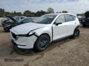 ✅ 2021 Mazda CX-5 Touring • VIN: JM3KFBCM9M1492438 • Lot: 86594165. Wystawiony na Copart z przebiegiem 94 049 mil. Bezpłatny archiwum sprzedaży aukcyjnych z USA i szczegółowy raport historii pojazdu na DreamBid. Zdjęcie 1.