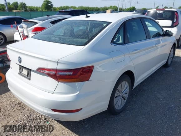 ✅ 2019 Volkswagen Jetta S • VIN: 3VWC57BU9KM105334 • Lot: 42051206. Listed on IAAI with 103,184 mi. Free auction sales archive from the USA and detailed vehicle history report at DreamBid. Image 4.