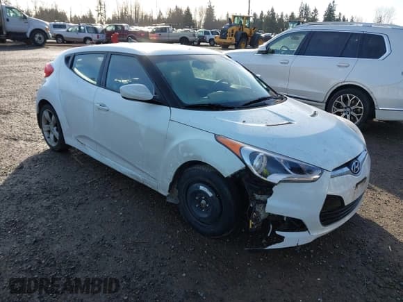✅ 2014 Hyundai Veloster • VIN: KMHTC6AD9EU185928 • Lot: 41720927. Wystawiony na IAAI z przebiegiem 94 023 mil. Bezpłatny archiwum sprzedaży aukcyjnych z USA i szczegółowy raport historii pojazdu na DreamBid. Zdjęcie 1.