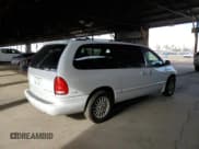 ✅ 2000 Chrysler Town & Country LX • VIN: 1C4GP44G1YB695954 • Lot: 81362815. Listed on Copart with 185,155 mi. Free auction sales archive from the USA and detailed vehicle history report at DreamBid. Image 3.