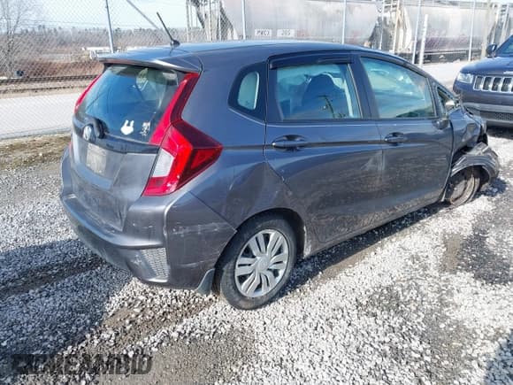 ✅ 2015 Honda Fit LX • VIN: 3HGGK5H55FM708516 • Lot: 43853993. Listed on IAAI with 88,801 mi. Free auction sales archive from the USA and detailed vehicle history report at DreamBid. Image 4.