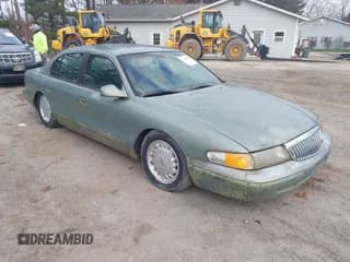 ✅ 1995 Lincoln Continental • VIN: 1LNLM97V3SY706547 • Lot: 43679905. Wystawiony na IAAI z przebiegiem 85 918 mil. Bezpłatny archiwum sprzedaży aukcyjnych z USA i szczegółowy raport historii pojazdu na DreamBid. Zdjęcie 1.