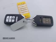 ✅ 2021 Honda Passport EX-L • VIN: 5FNYF8H55MB004813 • Lot: 41262942. Listed on IAAI with 69,585 mi. Free auction sales archive from the USA and detailed vehicle history report at DreamBid. Image 11.