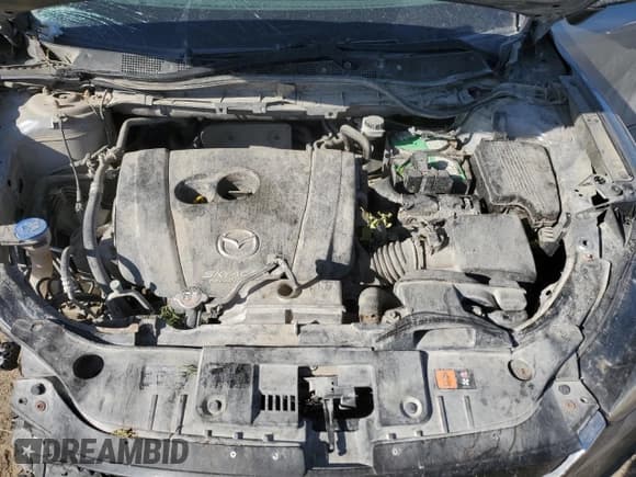 ✅ 2014 Mazda CX-5 Grand Touring • VIN: JM3KE4DY1E0426327 • Лот: 70492415. Опубликован ранее на Copart с пробегом 177 180 миль. Бесплатный доступ к архиву аукционных продаж из США и подробный отчёт об истории автомобиля на DreamBid. Изображение 11.