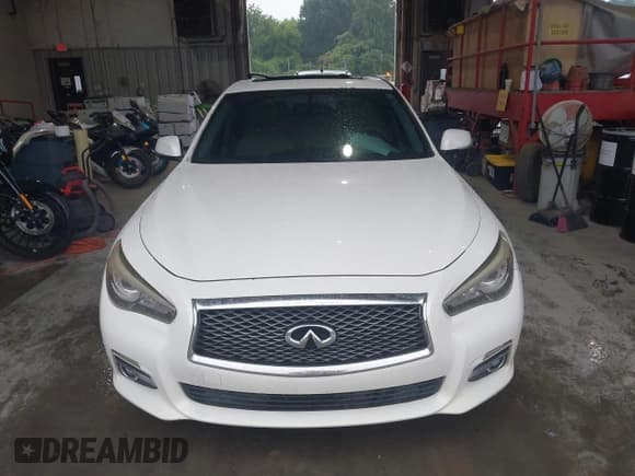 ✅ 2014 Infiniti Q50 Premium • VIN: JN1BV7AP5EM692015 • Lot: 42412718. Listed on IAAI with 202,124 mi. Free auction sales archive from the USA and detailed vehicle history report at DreamBid. Image 12.