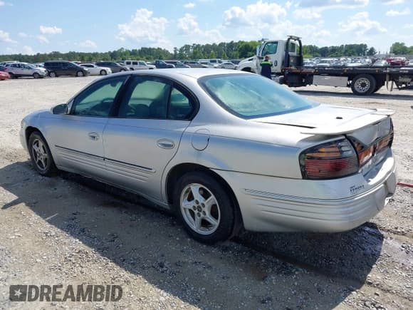✅ 2000 Pontiac Bonneville SE • VIN: 1G2HX54K3Y4282621 • Lot: 42584186. Wystawiony na IAAI z przebiegiem 264 418 mil. Bezpłatny archiwum sprzedaży aukcyjnych z USA i szczegółowy raport historii pojazdu na DreamBid. Zdjęcie 3.