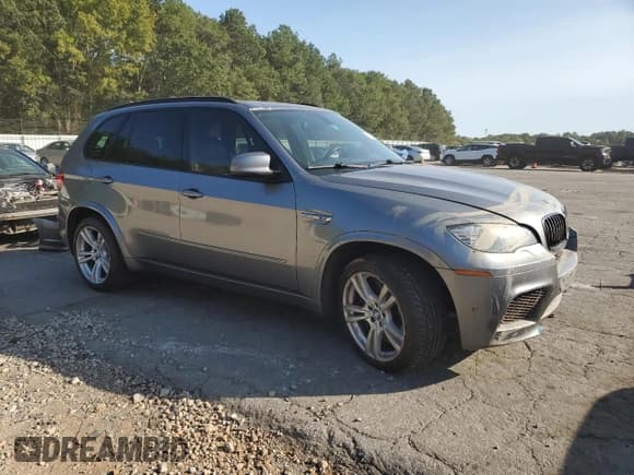 ✅ 2012 BMW X5 M • VIN: 5YMGY0C58CLK27364 • Lot: 76092254. Listed on Copart with 211,622 mi. Free auction sales archive from the USA and detailed vehicle history report at DreamBid. Image 4.