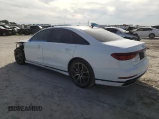 ✅ 2020 Audi A8 • VIN: WAU8DAF81LN015654 • Лот: 79126853. Опубликован ранее на Copart с пробегом 26 587 миль. Бесплатный доступ к архиву аукционных продаж из США и подробный отчёт об истории автомобиля на DreamBid. Изображение 2.