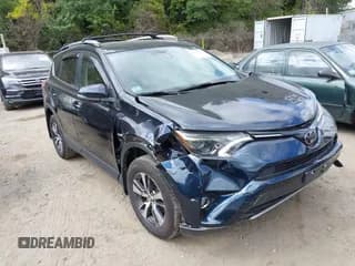 ✅ 2018 Toyota RAV4 XLE • VIN: JTMRFREV3JJ233042 • Lot: 43155436. Listed on IAAI with 96,634 mi. Free auction sales archive from the USA and detailed vehicle history report at DreamBid. Image 1.