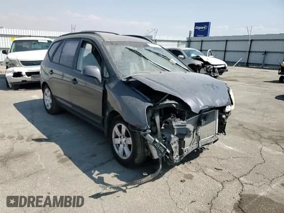 ✅ 2007 Kia Rondo LX • VIN: KNAFG525X77121936 • Lot: 71468555. Wystawiony na Copart z przebiegiem 167 330 mil. Bezpłatny archiwum sprzedaży aukcyjnych z USA i szczegółowy raport historii pojazdu na DreamBid. Zdjęcie 13.