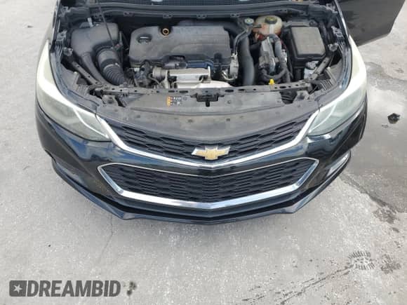 2017 Chevrolet Cruze LT с VIN 1G1BE5SM9H7247794, выставлен на аукционе Copart как лот 90426235 с пробегом 101 687 миль миль и Списание • Salvage title. История ставок и продаж доступна на DreamBid. Изображение 11.