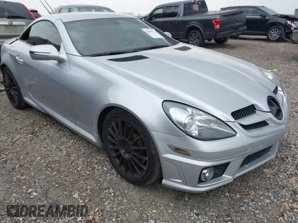 ✅ 2011 Mercedes-Benz SLK • VIN: WDBWK5JA3BF238884 • Lot: 42092753. Listed on IAAI with 94,744 mi. Free auction sales archive from the USA and detailed vehicle history report at DreamBid. Image 1.